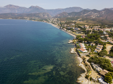 Aerial view of the village of Saint Florent, Corsica. France. Harbor boats and housesの写真素材