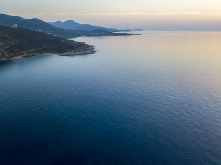 Aerial view of Corsica coast at sunset, promontories bordering the sea. franceの写真素材