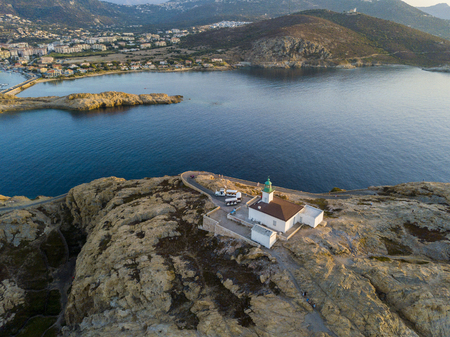 Aerial view of the Stone Lighthouse at sunset, Ile-Rousse, Red Island Corsica, Corsica, Franceの写真素材