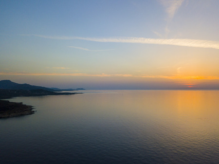 Aerial view of Corsica coast at sunset, promontories bordering the sea. franceの写真素材