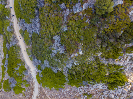 Aerial view of the panoramic path that leads to the promontory view to admire the bloody islands. Hiking trail. Corsica, Franceの写真素材