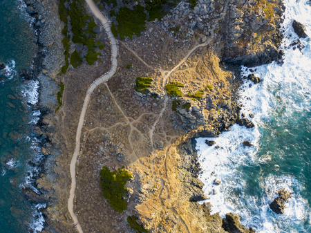 Aerial view of the panoramic path that leads to the promontory view to admire the bloody islands. Hiking trail. Corsica, Franceの写真素材