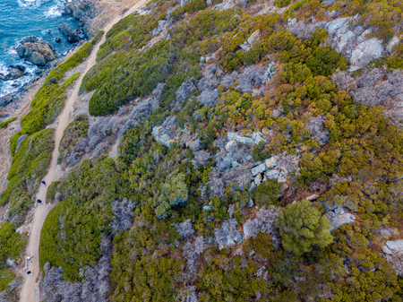 Aerial view of the panoramic path that leads to the promontory view to admire the bloody islands. Hiking trail. Corsica, Franceの写真素材