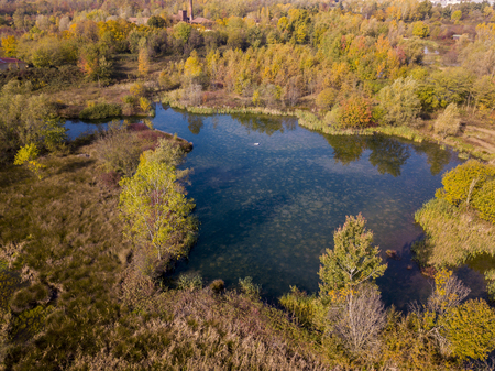 Nature and landscape: aerial view of a forest and lakes, autumn leaves, foliage, greenery and trees in a wilderness landscapeの写真素材