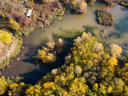 Nature and landscape: aerial view of a forest and lakes, autumn leaves, foliage, greenery and trees in a wilderness landscapeの写真素材