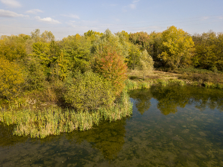 Nature and landscape: aerial view of a forest and lakes, autumn leaves, foliage, greenery and trees in a wilderness landscapeの写真素材