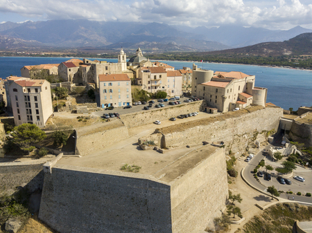 Aerial view of Calvi city, Corsica, France. Walls of the city, cliff overlooking the seaの写真素材
