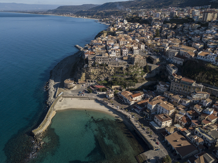 Aerial view of Pizzo Calabro, pier, castle, Calabria, tourism Italy. Pizzo Calabro by the sea. Houses on the rock. On the cliff stands the Aragonese castleの写真素材