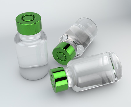 Drug vial, drug administration. Vial with green capの写真素材