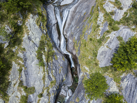 Valley of nature lovers in the valley of Val di Mello, a valley in the valley of Val di Mello, Renamed the Italian Yosemite Valley. Val Masino, Valtellina, Sondrio. Italyの写真素材