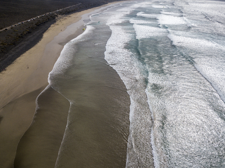 Crashing on the coast. Famara Beach, Lanzarote, Canary Islands, Spainの写真素材