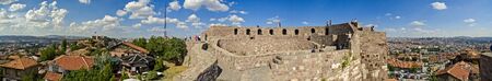 Panoramic view of Ankara Castle (Kalesi). It was a fortification from the late antique / early medieval era in Ankara, Turkey. 360 degree view of the capital of Turkey. Tourists on the walls of the manorの写真素材