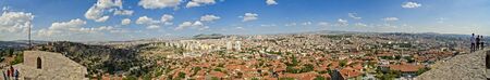 Panoramic view of Ankara Castle (Kalesi). It was a fortification from the late antique / early medieval era in Ankara, Turkey. 360 degree view of the capital of Turkey. Tourists on the walls of the manorの写真素材