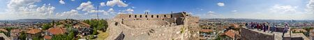 Panoramic view of Ankara Castle (Kalesi). It was a fortification from the late antique / early medieval era in Ankara, Turkey. 360 degree view of the capital of Turkey. Tourists on the walls of the manorの写真素材