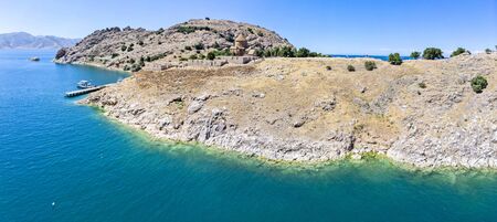 Aerial view of Akdamar Holy Cross Church, hidden monuments of Anatolia. Island of Akdamar on lake Van, eastern Turkey. Akdamar Church is remarkable for its exceptionally rich stone reliefsの写真素材