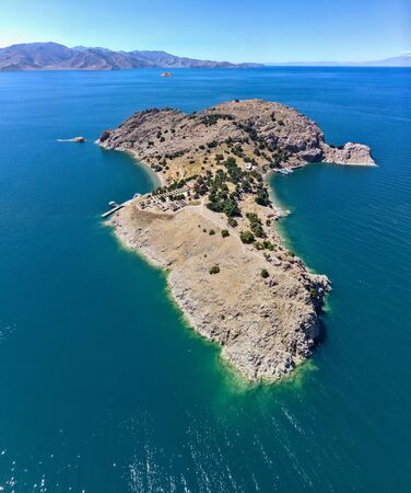 Aerial view of Akdamar Holy Cross Church, hidden monuments of Anatolia. Island of Akdamar on lake Van, eastern Turkey. Akdamar Church is remarkable for its exceptionally rich stone reliefsの写真素材