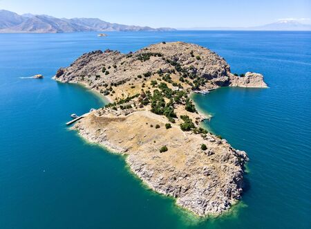 Aerial view of Akdamar Holy Cross Church, hidden monuments of Anatolia. Island of Akdamar on lake Van, eastern Turkey. Akdamar Church is remarkable for its exceptionally rich stone reliefsの写真素材