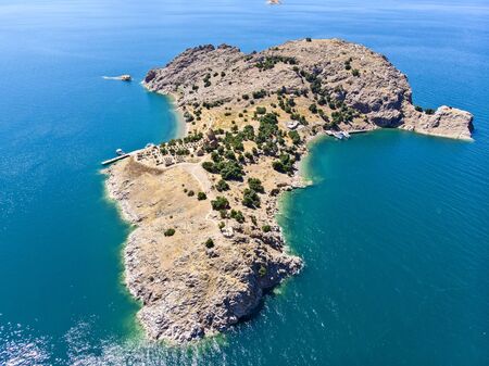 Aerial view of Akdamar Holy Cross Church, hidden monuments of Anatolia. Island of Akdamar on lake Van, eastern Turkey. Akdamar Church is remarkable for its exceptionally rich stone reliefsの写真素材