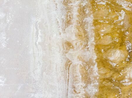 Aerial view of Lake Tuz, Tuz Golu. Salt Lake. White salt water. It is the second largest lake in the world and one of the largest hypersaline lakes in the world. It is located in the Central Anatolia Region, Ankara, Aksaray, Konyaの写真素材