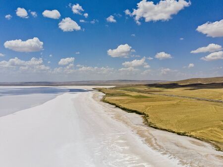 Aerial view of Lake Tuz, Tuz Golu. Salt Lake. White salt water. It is the second largest lake in the world and one of the largest hypersaline lakes in the world. It is located in the Central Anatolia Region, Ankara, Aksaray, Konyaの写真素材
