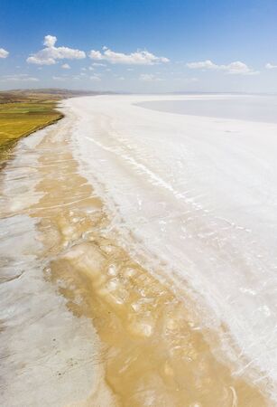 Aerial view of Lake Tuz, Tuz Golu. Salt Lake. White salt water. It is the second largest lake in the world and one of the largest hypersaline lakes in the world. It is located in the Central Anatolia Region, Ankara, Aksaray, Konyaの写真素材
