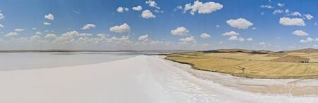 Aerial view of Lake Tuz, Tuz Golu. Salt Lake. White salt water. It is the second largest lake in the world and one of the largest hypersaline lakes in the world. It is located in the Central Anatolia Region, Ankara, Aksaray, Konyaの写真素材