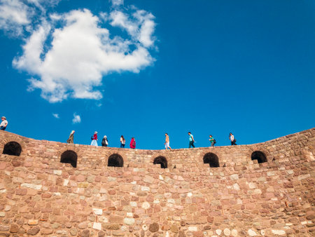 View of the walls of Ankara Castle (Kalesi), people walking on the walls. Sunny day with clouds. 06/27/2019. Capital of Turkey. Historical monumentのeditorial素材