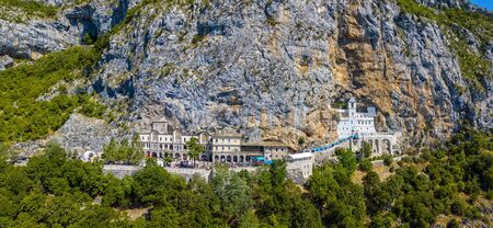 Aerial view of the Monastery of Ostrog, Serbian Orthodox Church in Ostro? Ka Greda, Montenegro. Dedicated to Saint Basil of Ostrog. Winding roadsの写真素材