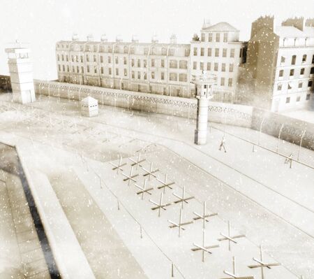 The Berlin Wall was a guarded concrete barrier that physically divided Berlin from 1961 to 1989. The barrier included guard towers, accompanied by a wide area (death strip), militarizedの写真素材