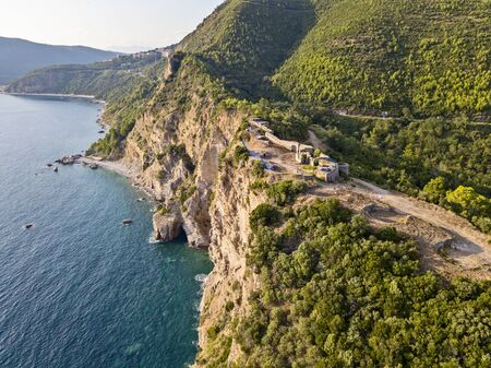 Aerial view of Mogren Fortress, Tvrdava Mogren, it is located on a promontory Mogren between the beaches Mogren and Jaz just a kilometer from the town of Budva. Montenegro. Jagged coastの写真素材