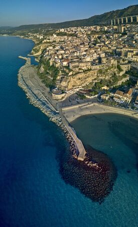 Aerial view of Pizzo Calabro, pier, castle, Calabria, tourism Italy. Panoramic view of the small town of Pizzo Calabro by the sea. Houses on the rock. On the cliff stands the Aragonese castle. Seafrontの写真素材