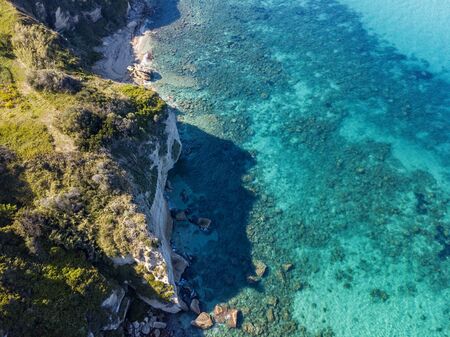 Aerial view of the Calabrian coast, cliffs overlooking the crystal clear sea. Locality of Riaci south of Tropea. Calabria. italyの写真素材