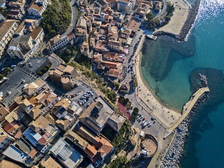 Aerial view of Pizzo Calabro, pier, castle, Calabria, tourism Italy. Panoramic view of the small town of Pizzo Calabro by the sea. Houses on the rock. On the cliff stands the Aragonese castle. Seafrontの写真素材