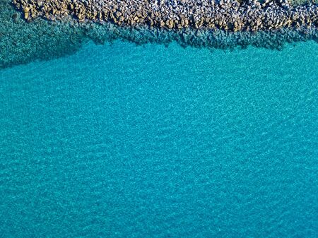 Aerial view of seabed seen from above, transparent waterの写真素材