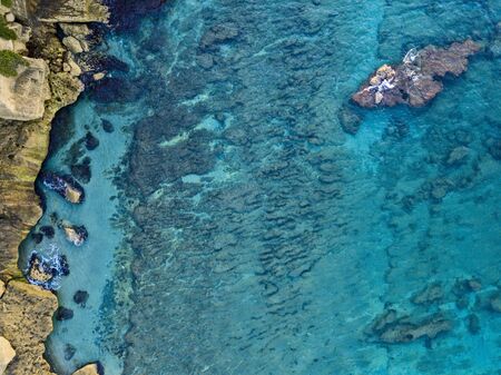 Aerial view of seabed seen from above, transparent waterの写真素材