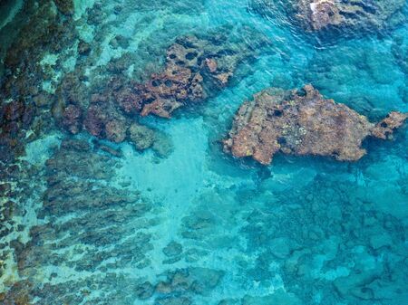 Aerial view of seabed seen from above, transparent waterの写真素材