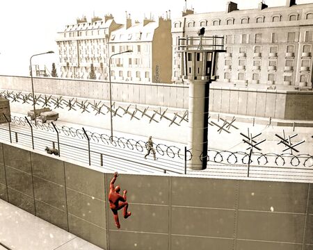 The  Wall was a guarded concrete barrier that physically divided Berlin from 1961 to 1989. The barrier included guard towers, accompanied by a wide area (death strip), militarized. Attempt to escape by climbing over the wallの写真素材