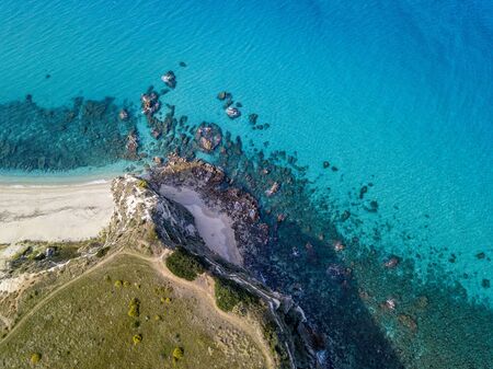 Aerial view of the Riaci promontory. Riaci beach near Tropea, Calabria. Italy. Transparent sea and wild. Cliff pathsの写真素材