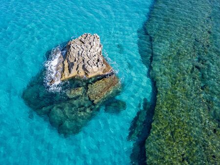 Aerial view of the Riaci rocks, Riaci beach near Tropea, Calabria. Italy. Transparent sea and wild coast.の写真素材