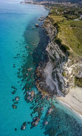 Aerial view of the Riaci promontory. Riaci beach near Tropea, Calabria. Italy. Transparent sea and wild. Cliff pathsの写真素材