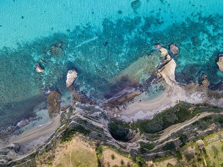 Aerial view of the Riaci promontory. Riaci beach near Tropea, Calabria. Italy. Transparent sea and wild. Cliff pathsの写真素材