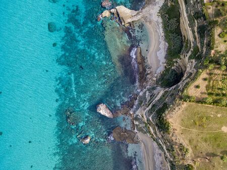 Aerial view of the Riaci promontory. Riaci beach near Tropea, Calabria. Italy. Transparent sea and wild. Cliff pathsの写真素材