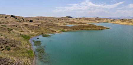 Aerial view of rural areas south of Lokman in the province of Adiyaman, Turkey. Inlets on the Euphrates river formed by the Ataturk dam. Desert landsの写真素材
