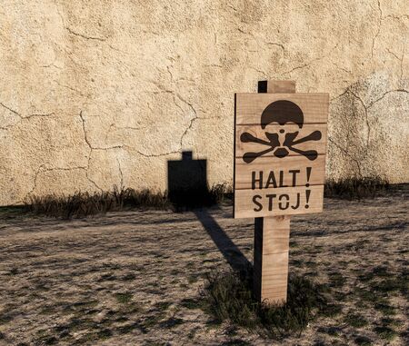 The sign stood between the housing blocks and double electric fence. Halt! - and - Stoj! means Stand! 3d renderの写真素材