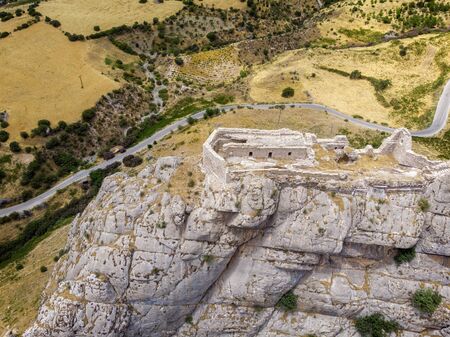 Aerial view of Kahta Castle, Kalesi. The Yeni Kale Fortress in Eski Kahta is perched atop a hill with a steep slope. Walls of the manor surround the entire hill. Very close to Mount Nemrut. Anatolia. turkeyの写真素材