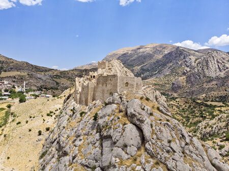 Aerial view of Kahta Castle, Kalesi. The Yeni Kale Fortress in Eski Kahta is perched atop a hill with a steep slope. Walls of the manor surround the entire hill. Very close to Mount Nemrut. Anatolia. turkeyの写真素材