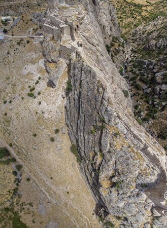 Aerial view of Kahta Castle, Kalesi. The Yeni Kale Fortress in Eski Kahta is perched atop a hill with a steep slope. Walls of the manor surround the entire hill. Very close to Mount Nemrut. Anatolia. turkeyの写真素材