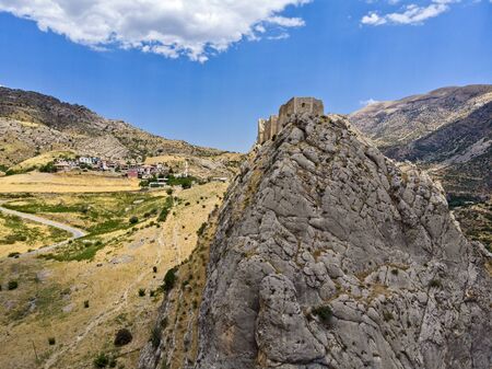 Aerial view of Kahta Castle, Kalesi. The Yeni Kale Fortress in Eski Kahta is perched atop a hill with a steep slope. Walls of the manor surround the entire hill. Very close to Mount Nemrut. Anatolia. turkeyの写真素材
