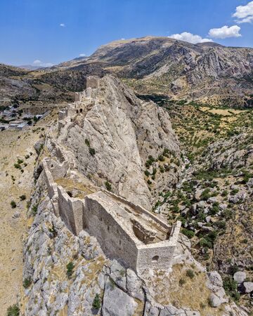 Aerial view of Kahta Castle, Kalesi. The Yeni Kale Fortress in Eski Kahta is perched atop a hill with a steep slope. Walls of the manor surround the entire hill. Very close to Mount Nemrut. Anatolia. turkeyの写真素材