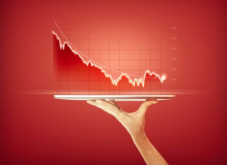 Businesswoman holding tablet and showing holographic graphs and stock market statistics lost profits. Concept of bad planning and business strategy. Bad economy, digital screen. HUDの写真素材